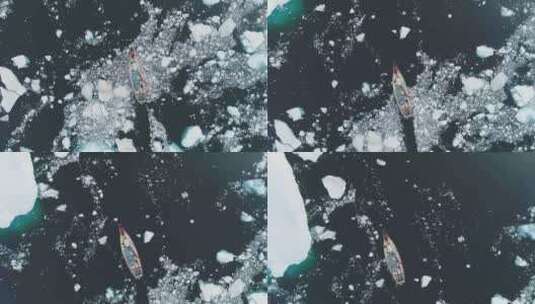 红色帆船游艇突破南极融化的冰海洋空中自上高清在线视频素材下载