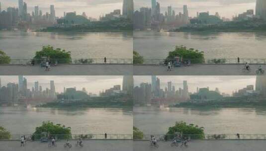 城市宣传-重庆-长嘉汇-江边骑车的人高清在线视频素材下载