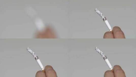 手夹着香烟特写高清在线视频素材下载