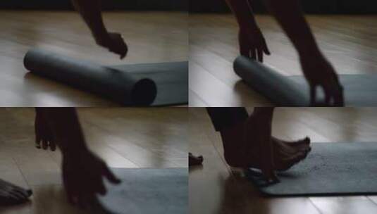 女人把瑜伽垫铺在地板上高清在线视频素材下载
