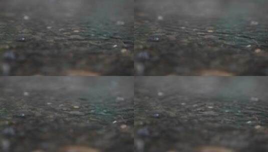 雨滴溅在地上高清在线视频素材下载