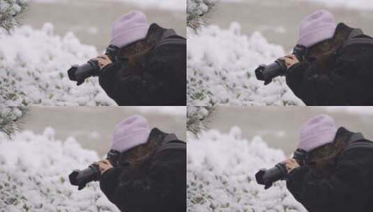 下雪天拍照的女孩高清在线视频素材下载