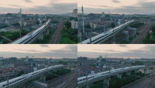 航拍在城市中穿行的高铁动车高清在线视频素材下载