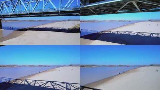 无人机穿过黄河大桥高清在线视频素材下载
