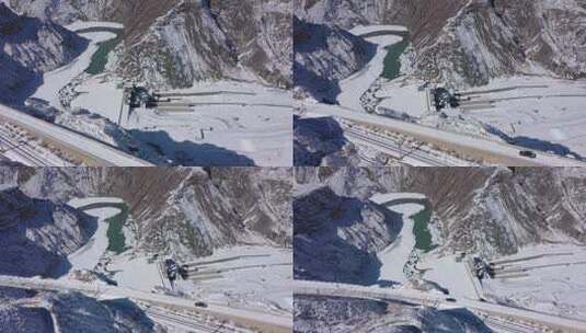 俯拍冰沟峡谷水电站雪景高清在线视频素材下载