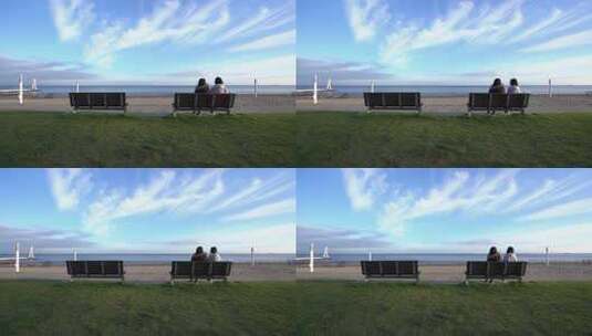 女孩坐在长凳上看着海滩的风景高清在线视频素材下载