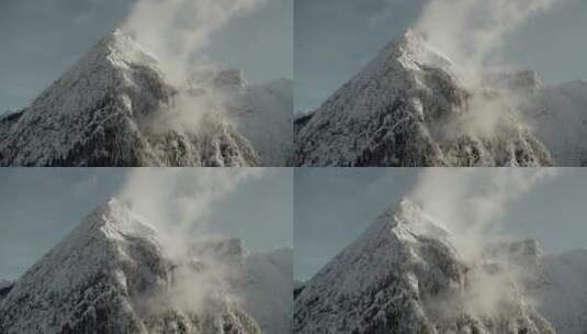 航拍阳光下的雪山日出巍峨山峰山脉山峦高清在线视频素材下载