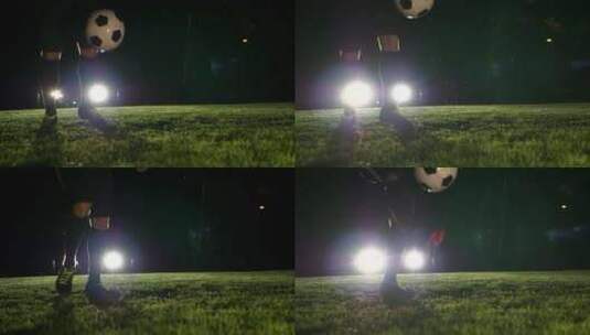 绿色草坪和灯光足球运动员高清在线视频素材下载