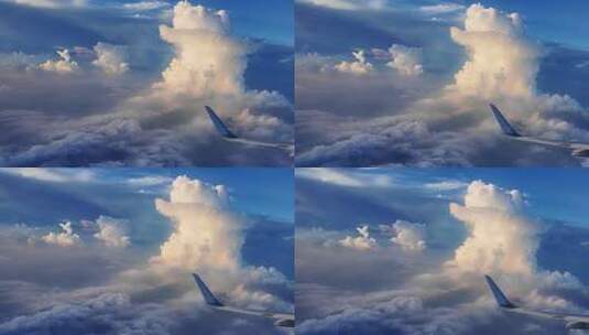 飞机舷窗看蓝天下的云朵变幻高清在线视频素材下载