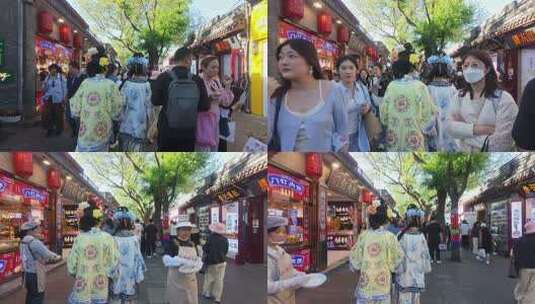4K北京古巷里的人潮人流清朝服饰背影高清在线视频素材下载