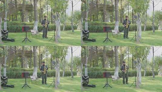 公园中男子演奏萨克斯素材高清在线视频素材下载