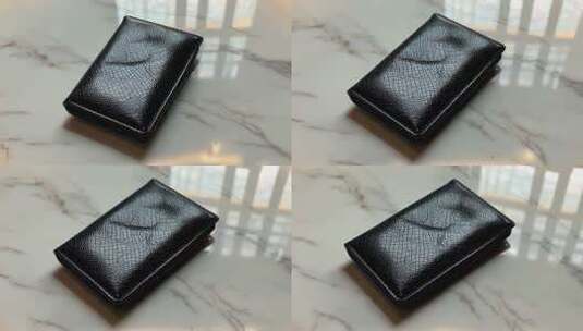 黑色皮革钱包特写高清在线视频素材下载