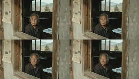 农村老人坐于老房窗边高清在线视频素材下载