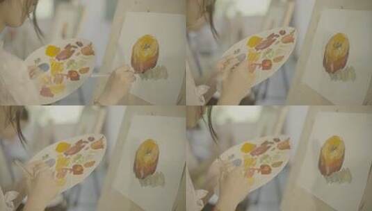 女孩持调色板作画特写高清在线视频素材下载