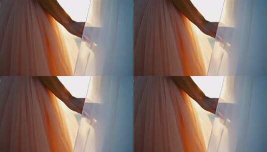 女性手持轻柔纱裙画面高清在线视频素材下载