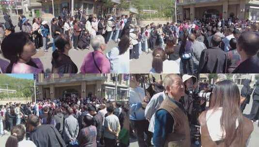 人群聚集在建筑物前围观高清在线视频素材下载