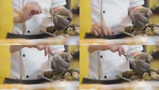 用小刀撬生蚝的厨师高清在线视频素材下载