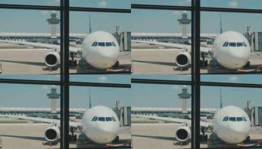 机场航站楼窗外的客机高清在线视频素材下载