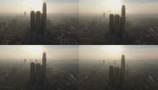 航拍 贵阳 城市 清晨 迷雾 高楼 吊塔高清在线视频素材下载