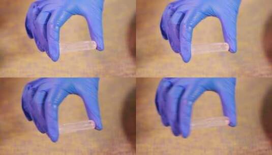 实验员戴手套试管采样加入重金属测试液高清在线视频素材下载