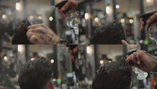 在头发上喷水的理发师高清在线视频素材下载