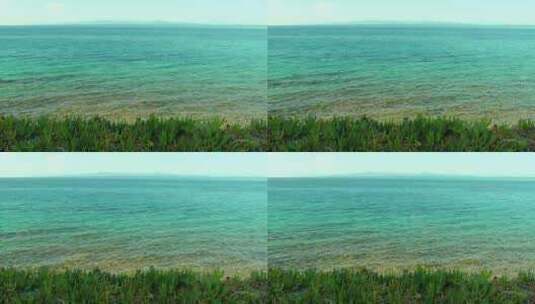 夏天的海岸线上有一片碧蓝的大海高清在线视频素材下载