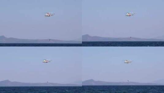 直升机从海上营救潜水员高清在线视频素材下载