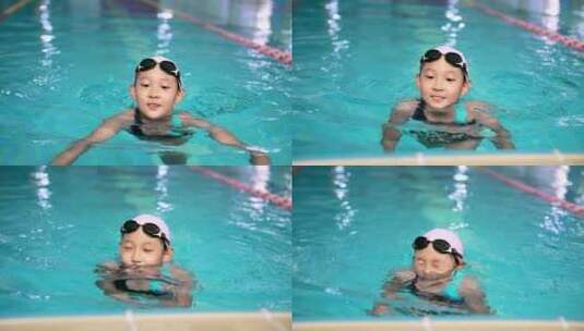 在泳池练习游泳的中国女孩高清在线视频素材下载