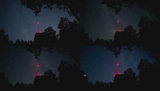 夜晚的森林灯塔和星星 美丽的星空高清在线视频素材下载