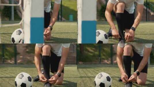 足球运动员蹲下系鞋带高清在线视频素材下载