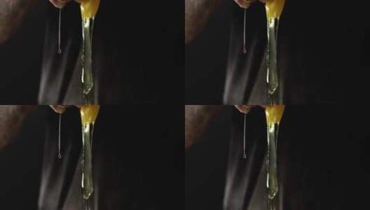 鸡蛋打入碗中的慢镜头特写高清在线视频素材下载