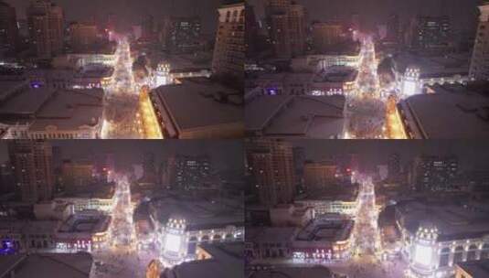 哈尔滨中央大街夜晚雪景航拍高清在线视频素材下载