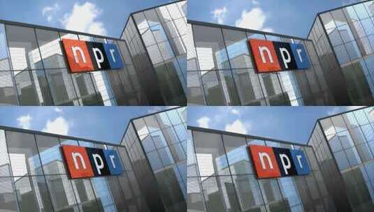 社论，国家公共广播电台在玻璃建筑上的标志。高清在线视频素材下载