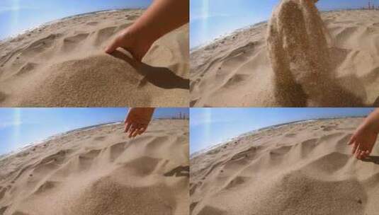 沙子从手指间飞溅高清在线视频素材下载