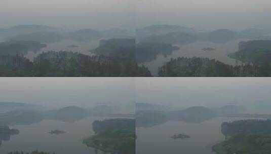 航拍武汉东湖公园清晨大雾水面高清在线视频素材下载