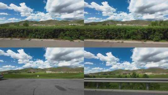 实拍开车行驶在蓝天白云下的公路高清在线视频素材下载
