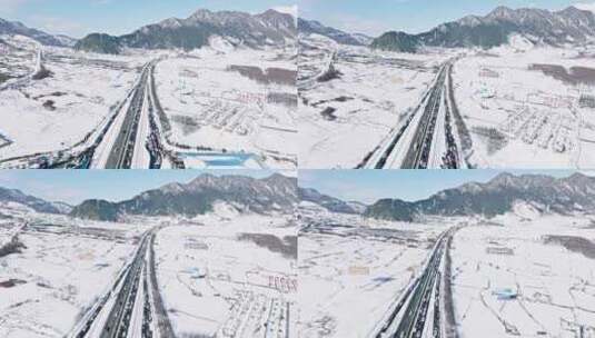 航拍雪地中的高速公路京昆高速雅西段堵车高清在线视频素材下载