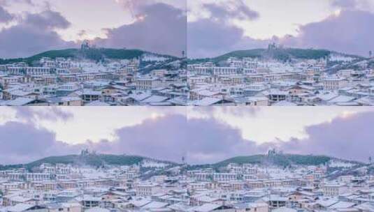 云南香格里拉独克宗古城白雪覆盖屋顶高清在线视频素材下载