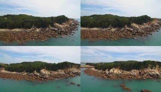 航拍平潭岛礁石上的石头厝与渔港沙滩北港村高清在线视频素材下载