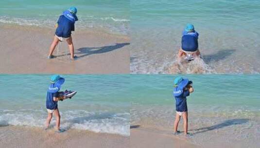 海南三亚正在海边沙滩上体验夏天海浪的男孩高清在线视频素材下载