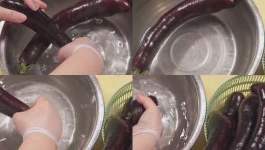 水盆清洗长茄子紫茄子洗茄子高清在线视频素材下载