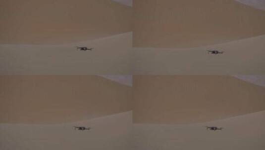 无人机晚上在沙漠上空盘旋高清在线视频素材下载
