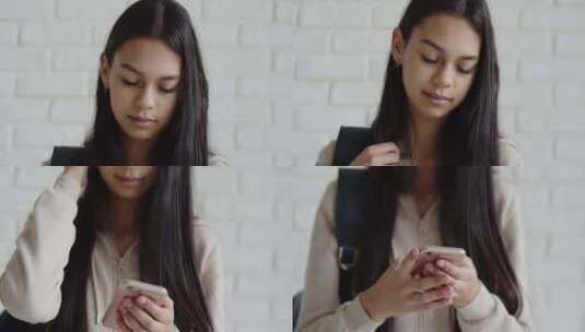 女孩使用手机高清在线视频素材下载