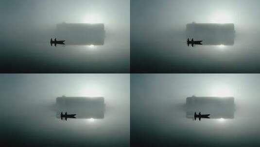 雾中航行：远处的船只与小船的宁静相遇高清在线视频素材下载