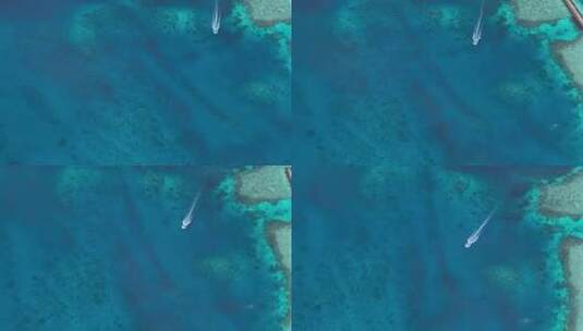 马尔代夫空中俯瞰海面行驶的船只高清在线视频素材下载