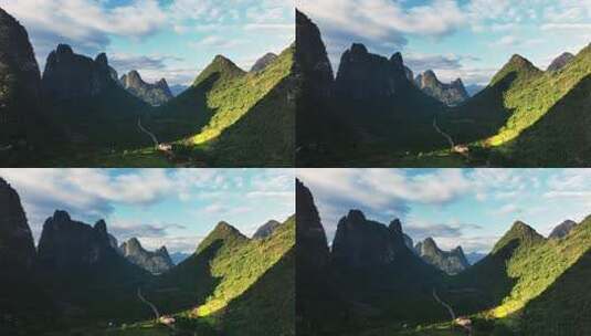 日出阳光下广西贺州山谷中的乡村公路和房屋高清在线视频素材下载