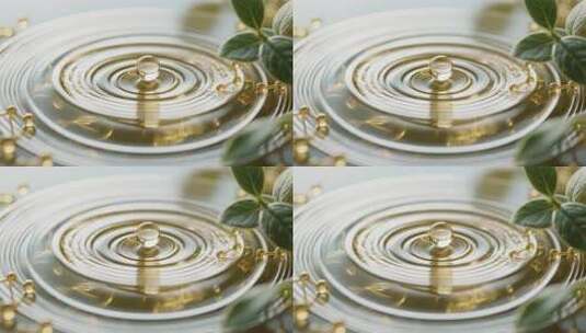 水滴落入水面产生涟漪素材高清在线视频素材下载