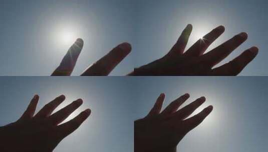 手触摸太阳祈求希望加油打气明天更好高清在线视频素材下载