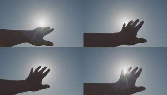 手触摸太阳祈求希望加油打气明天更好高清在线视频素材下载