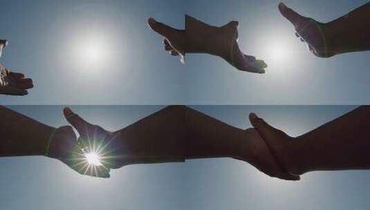 手触摸太阳祈求希望加油打气明天更好高清在线视频素材下载